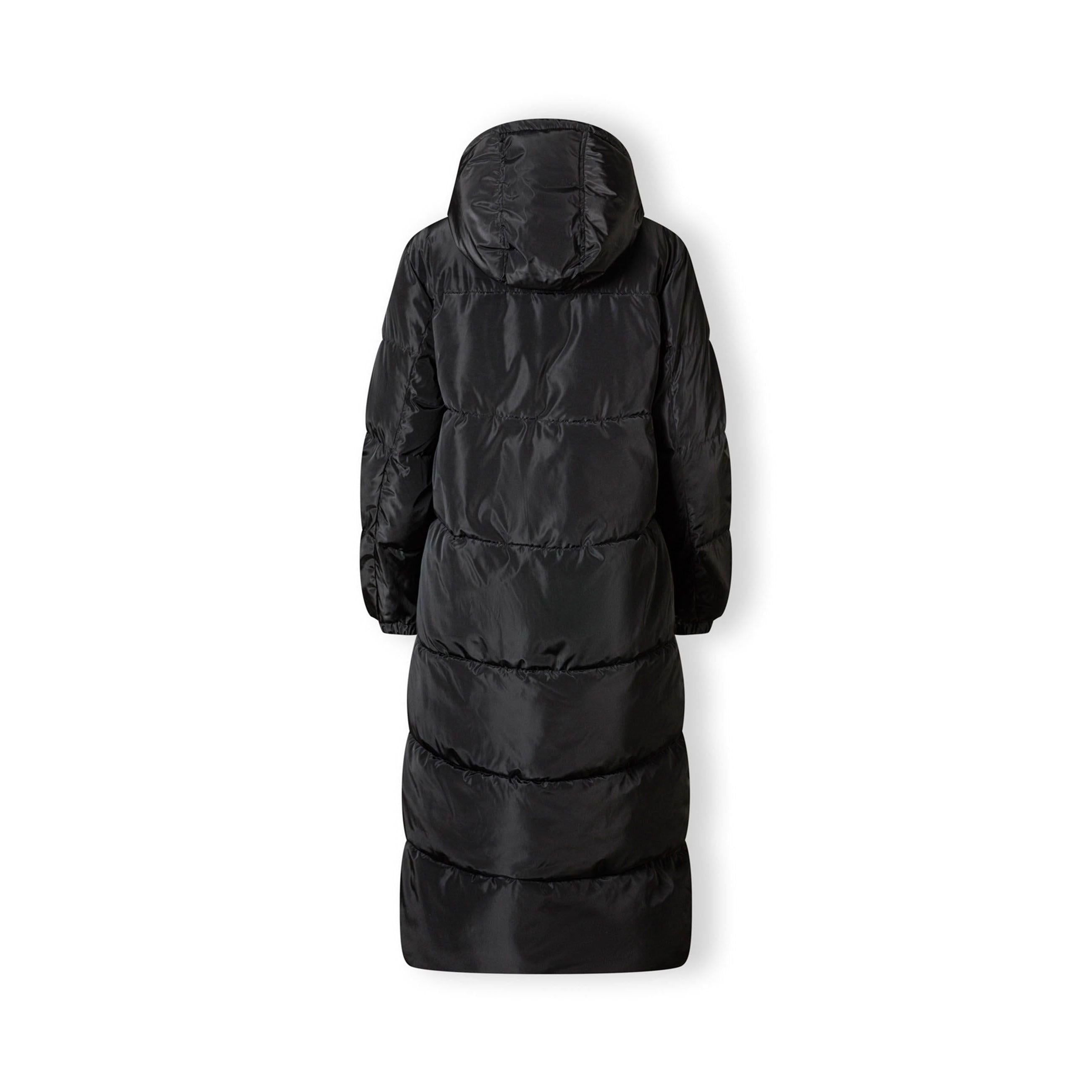 Close-up detail of black quilted jacket showing zip closure, quilted padding texture and drawstring hood cord