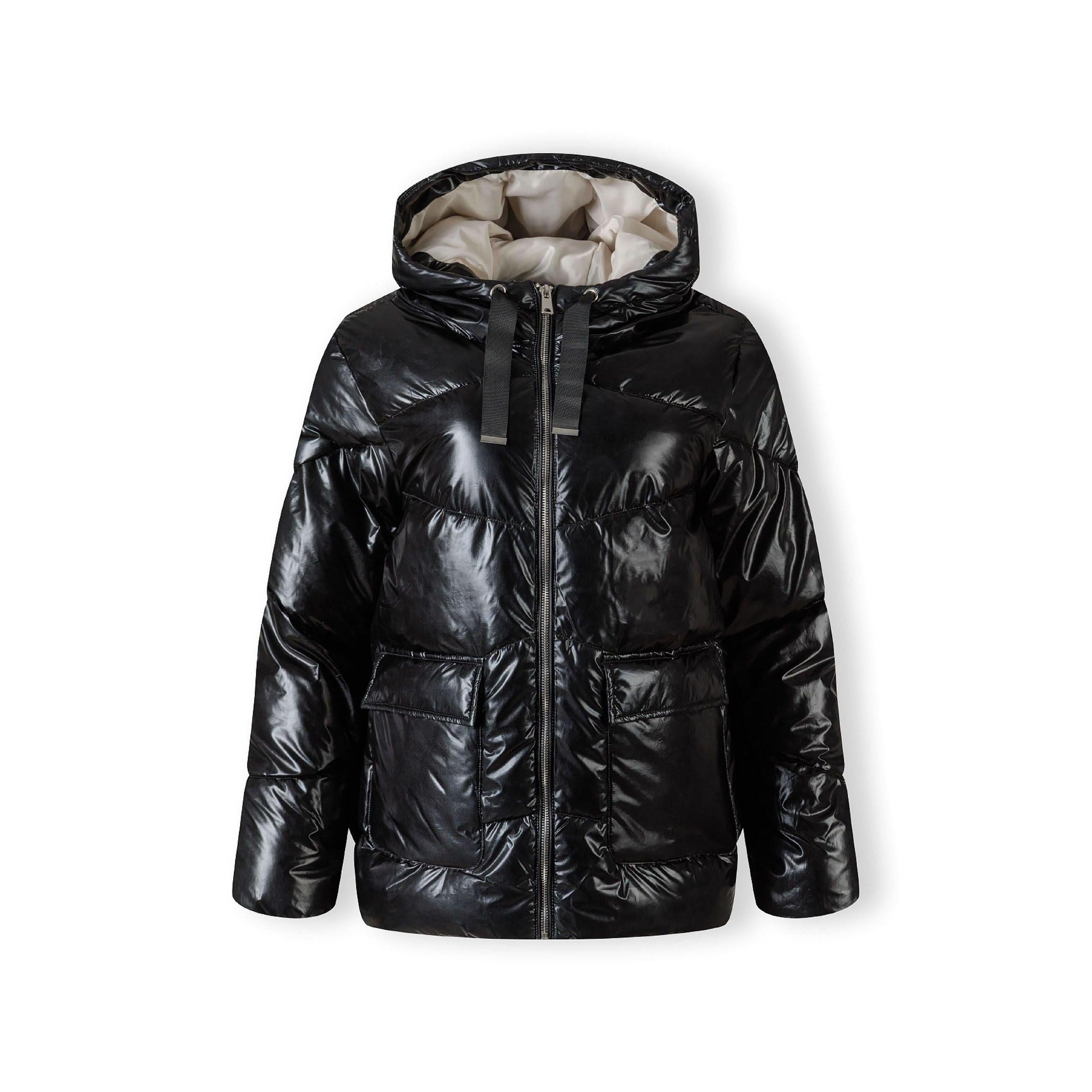 Black padded jacket laid flat showing back view with quilted pattern and hood