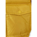 Close-up of a mustard boys teddy lined jacket, showing a flap pocket with a branded snap button.