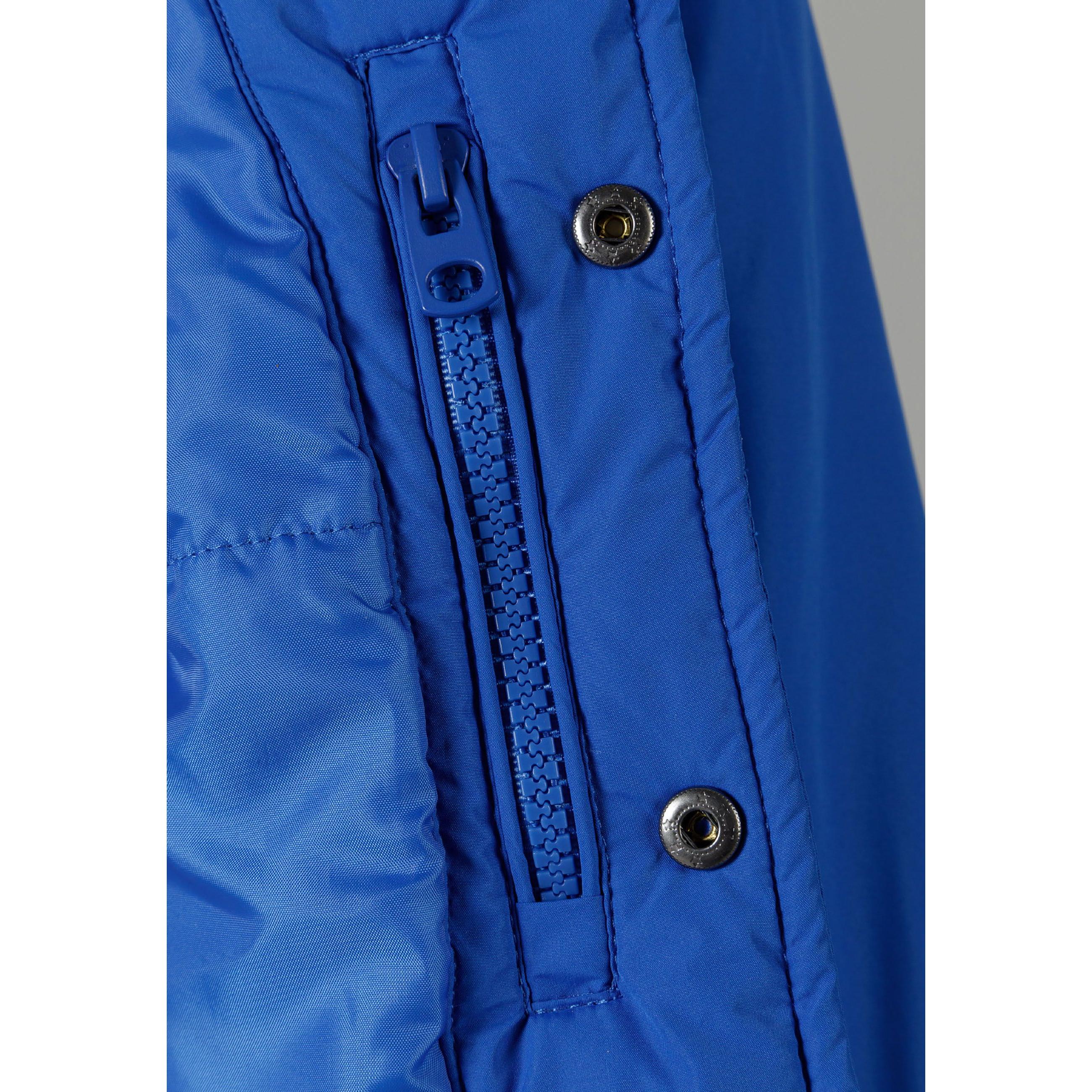 Cobalt blue baseball jacket laid flat showing full design with striped collar, cuffs, snap buttons and chest logo