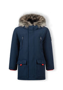 Boys winter parka in navy with faux fur hood, front view, featuring zippered chest pockets and flap pockets.