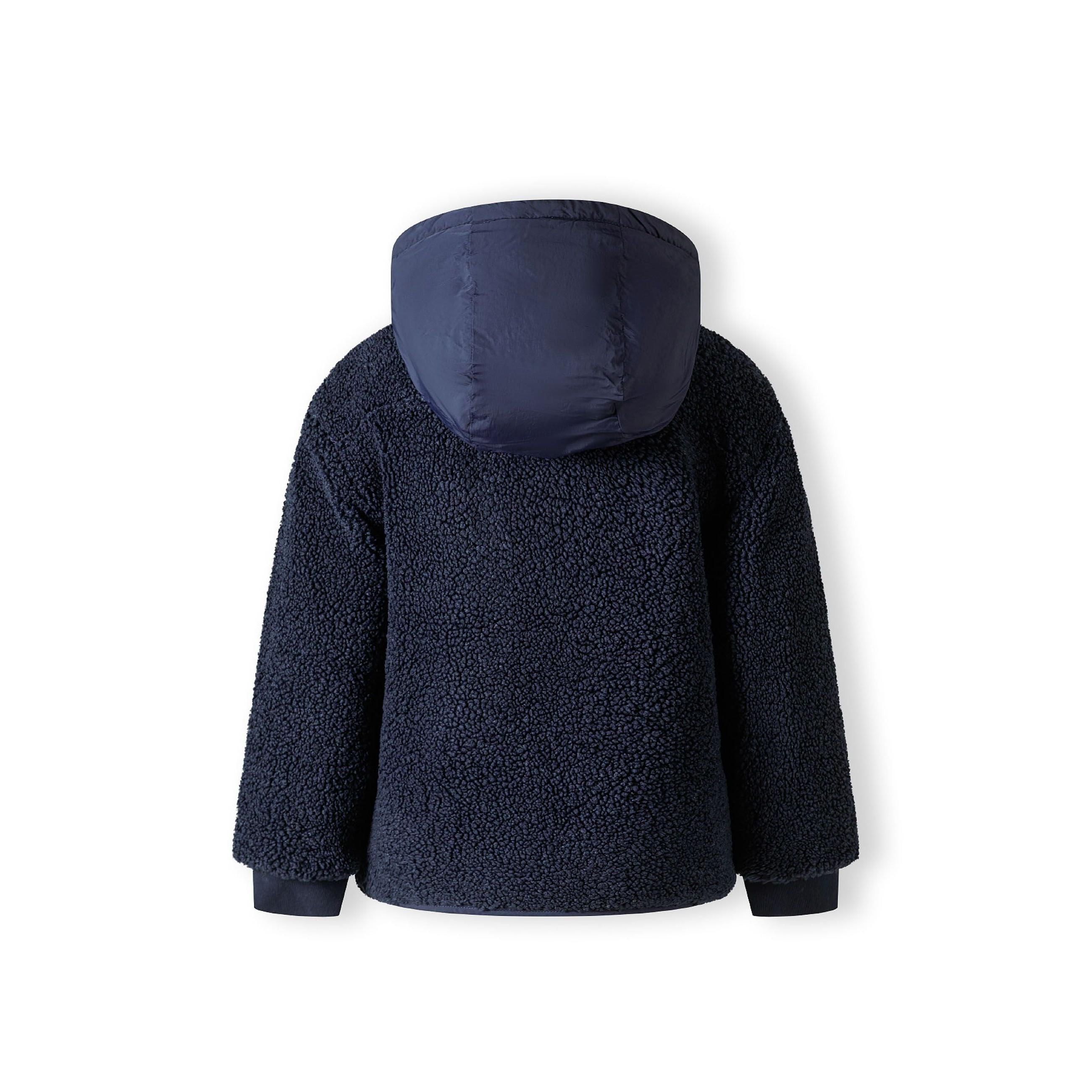 Back view of navy borg jacket showing quilted hood and sherpa fleece texture on white background