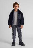 Boys black borg jacket with padding and chest zip pocket