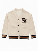 Boys buttoned sweatshirt in cream with chest applique, front view, featuring two patch pockets and ribbed cuffs.