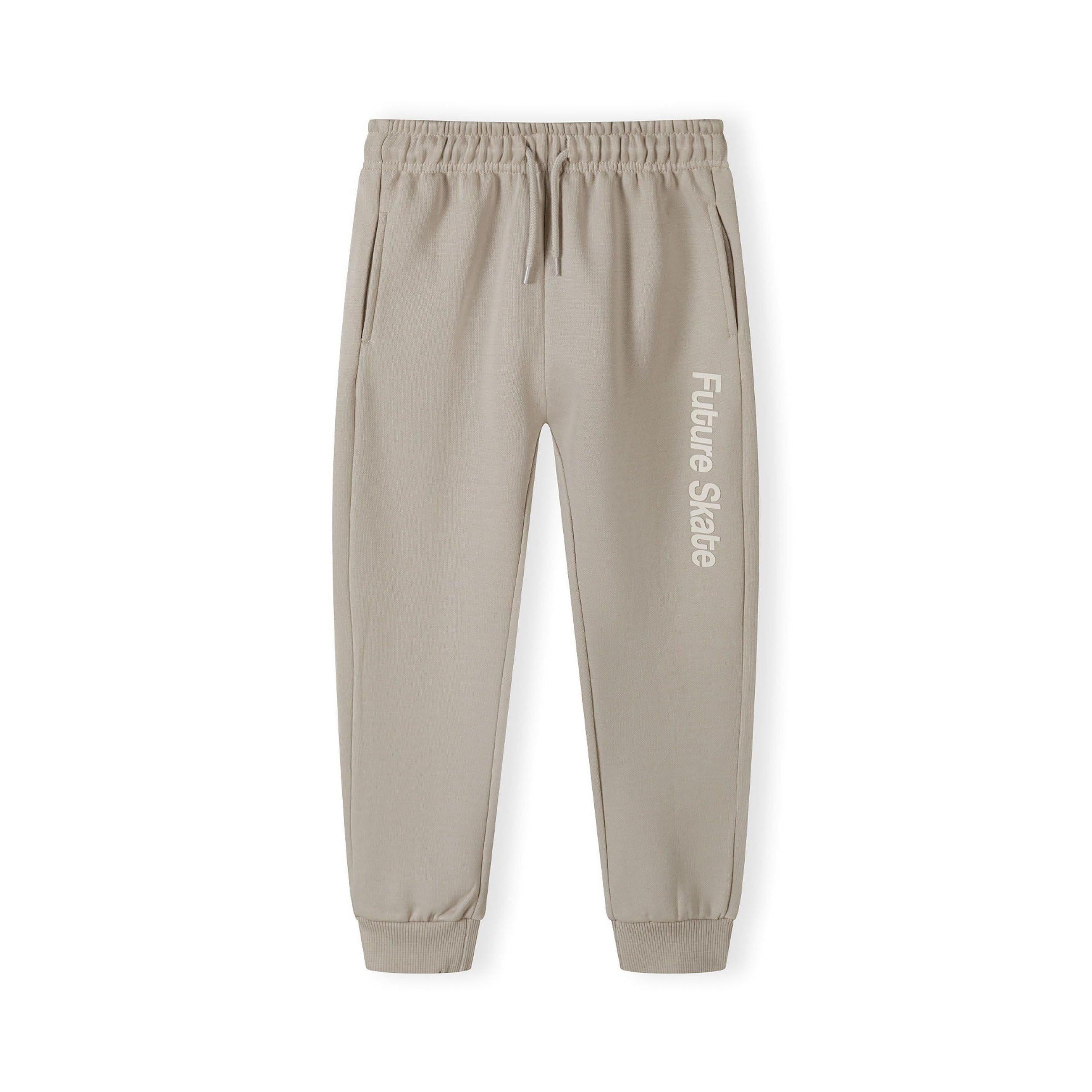 Grey joggers with Future Skate text print down the leg, featuring elastic waistband with drawstring and side pockets, displayed flat on white background