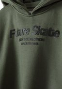 Close-up of khaki hoodie featuring 'Future Skate' rubber print on the chest.