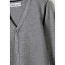 Close-up detail of grey cardigan showing Minoti label, button placket and V-neck construction with fine knit texture