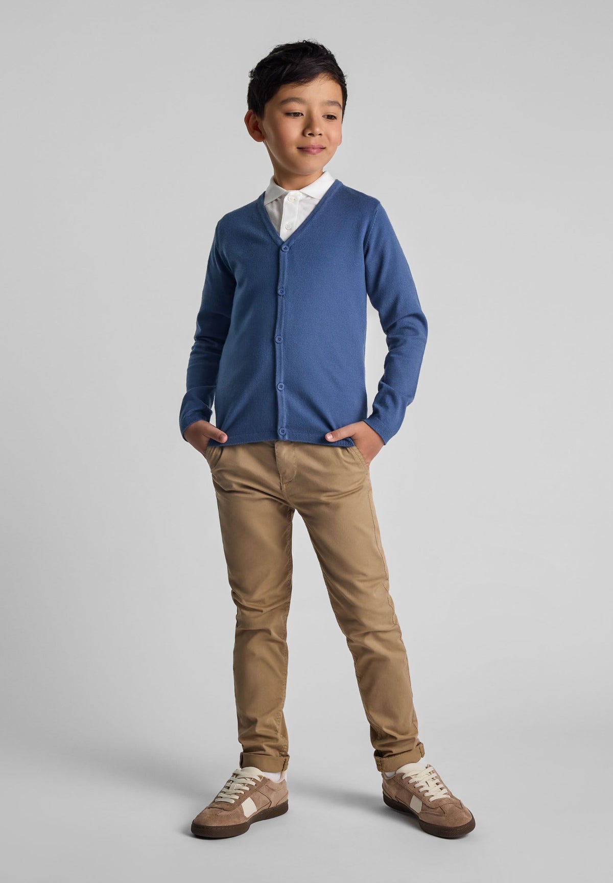 Blue v-neck cardigan, model front.