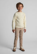 Boys cream cable knit sweater, crew neck, featuring ribbed trims.