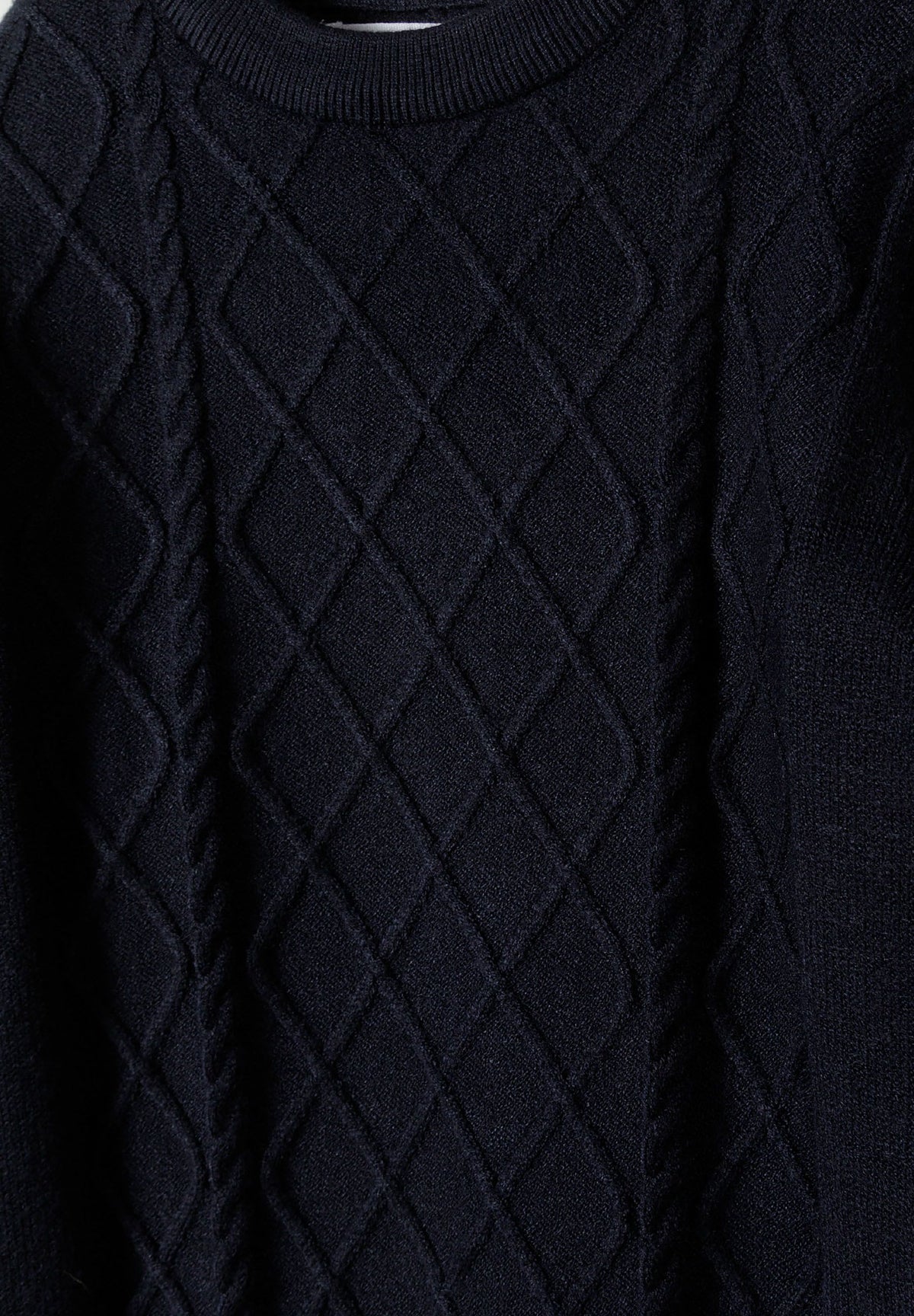 Navy cable knit jumper, knit detail.