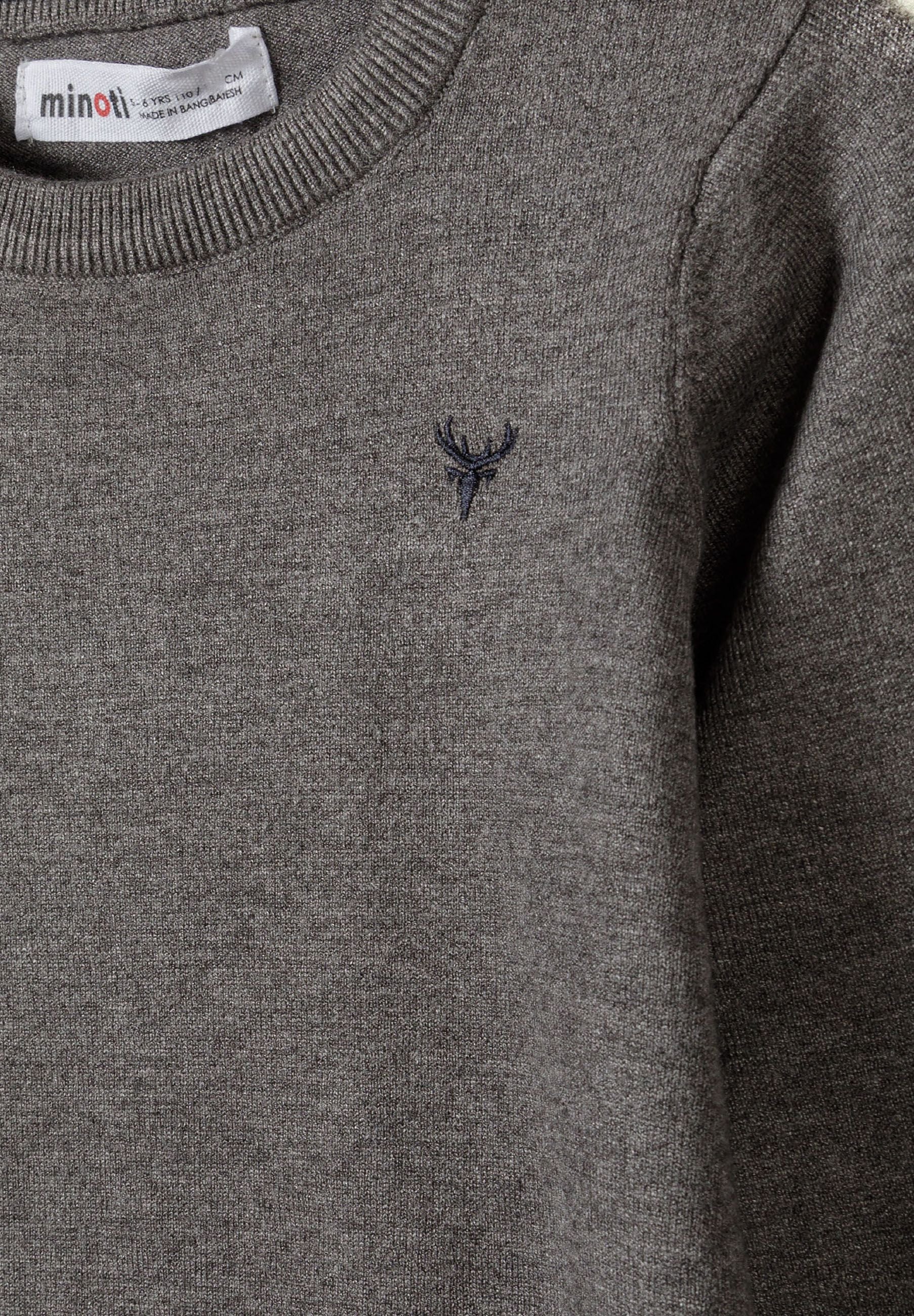 Detail of a boys grey fine knit jumper with chest embroidery and ribbed neckline.