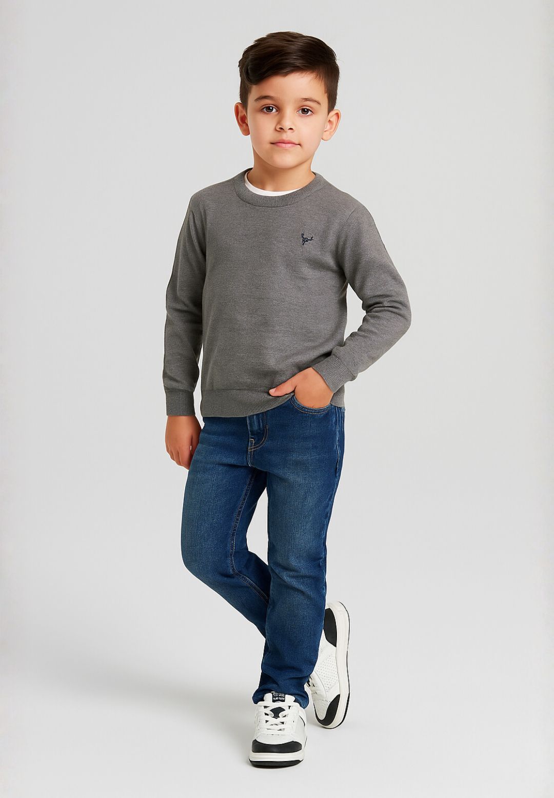 Grey fine knit jumper, model front.