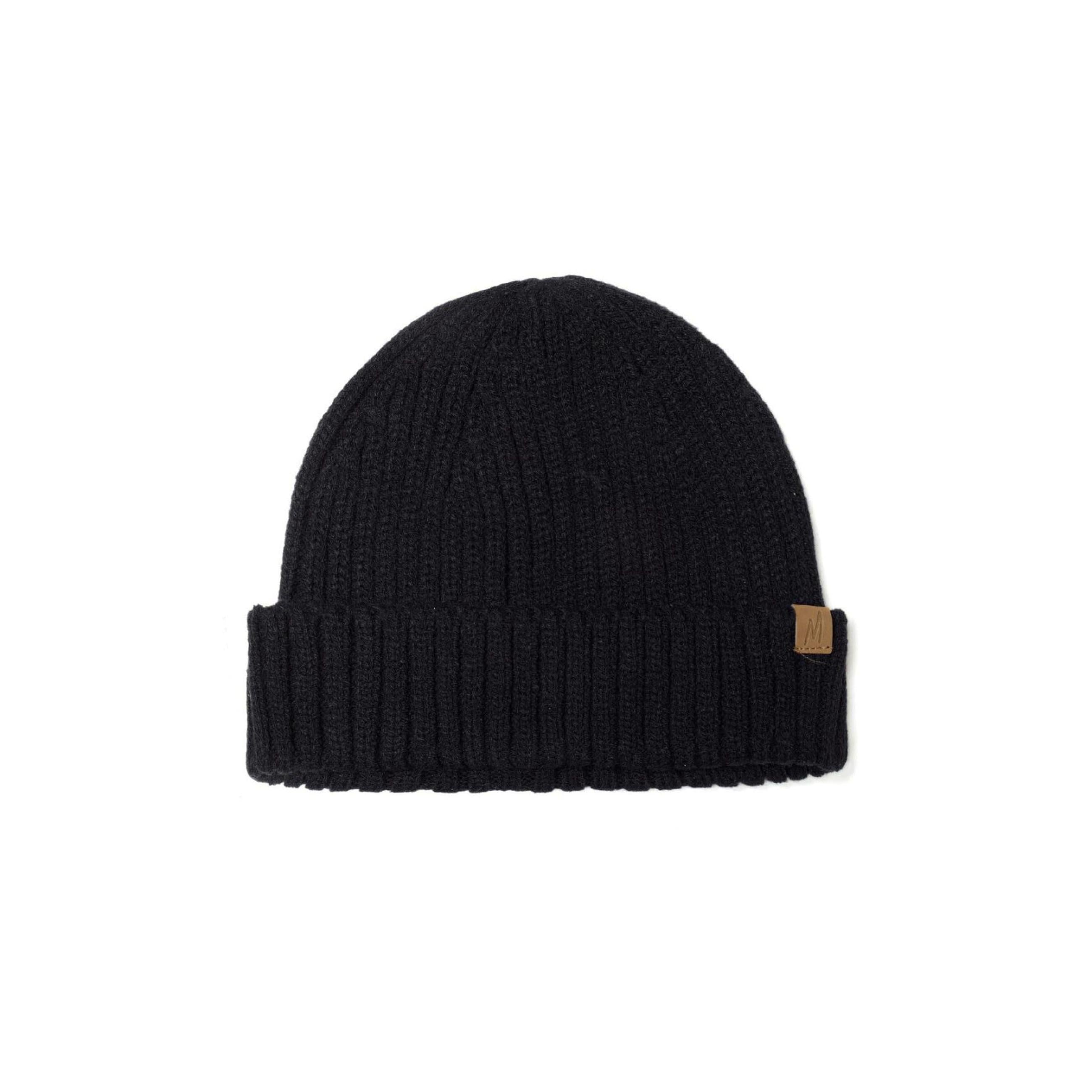 Black ribbed knit beanie displayed flat against white background showing fold-over cuff and brown M branded label