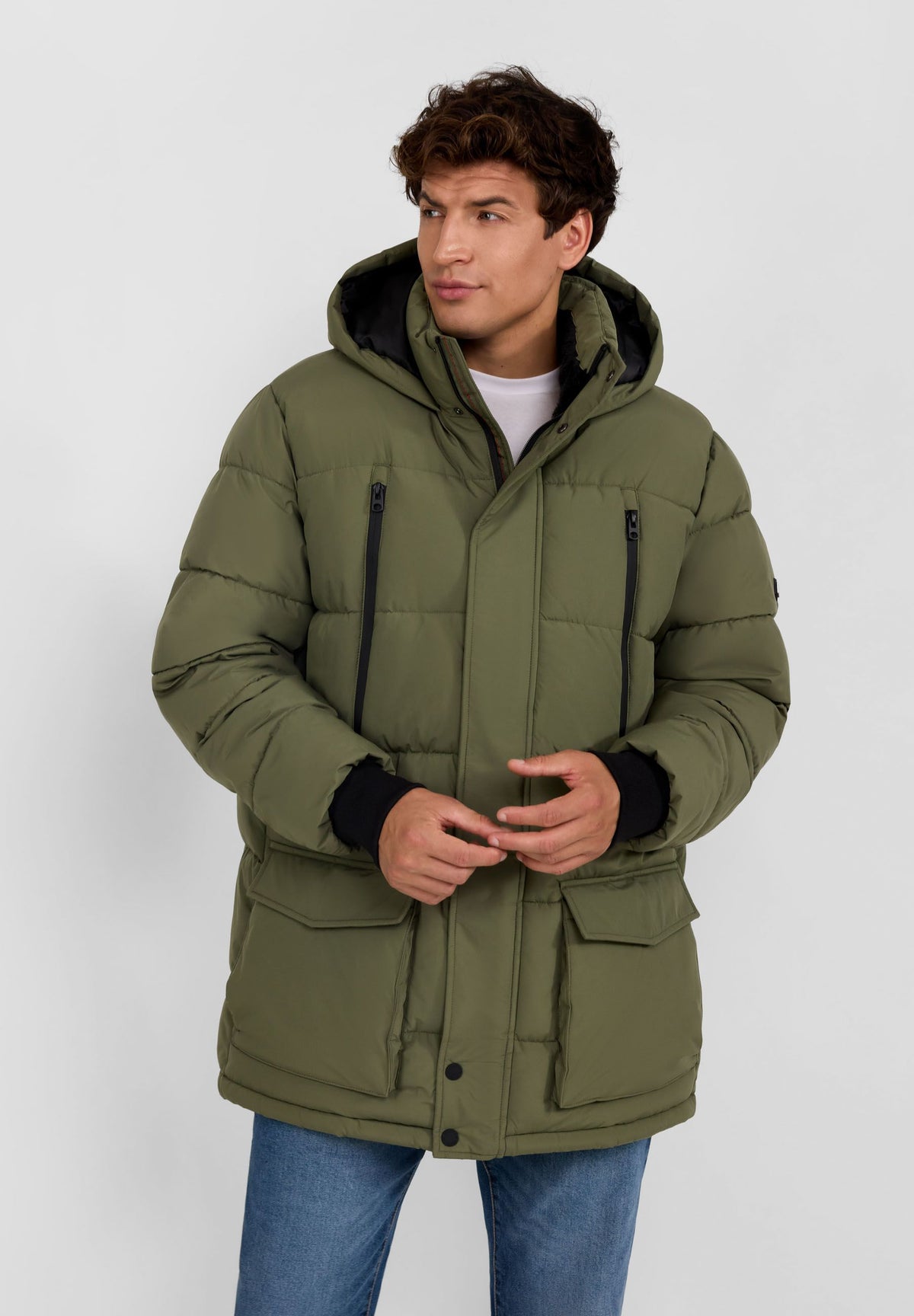 Men's khaki padded parka, shown worn.