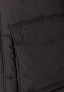 Detail of men's long jacket with flap pocket and fleece lining.