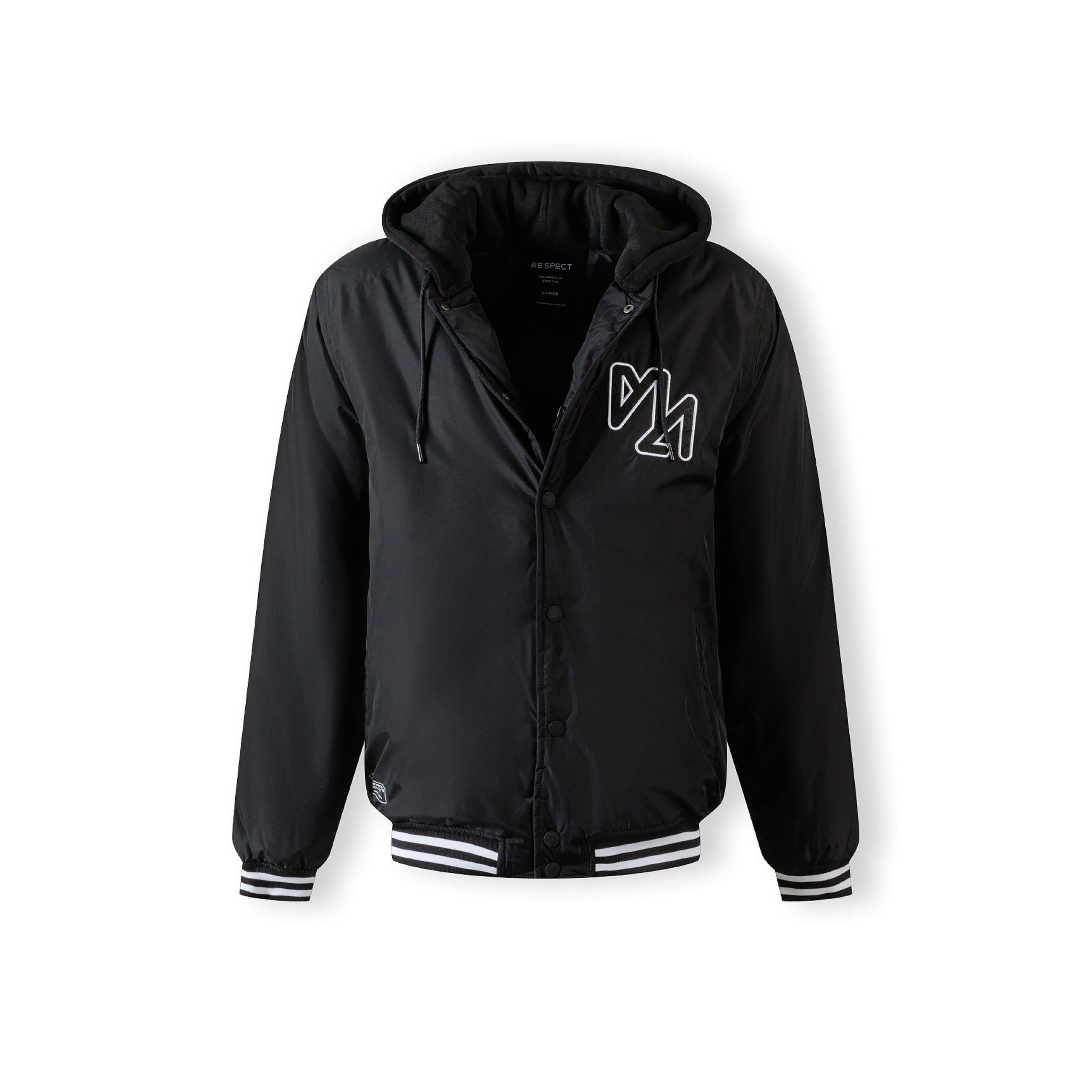 Close-up detail of black jacket showing zip closure with press studs and fabric texture