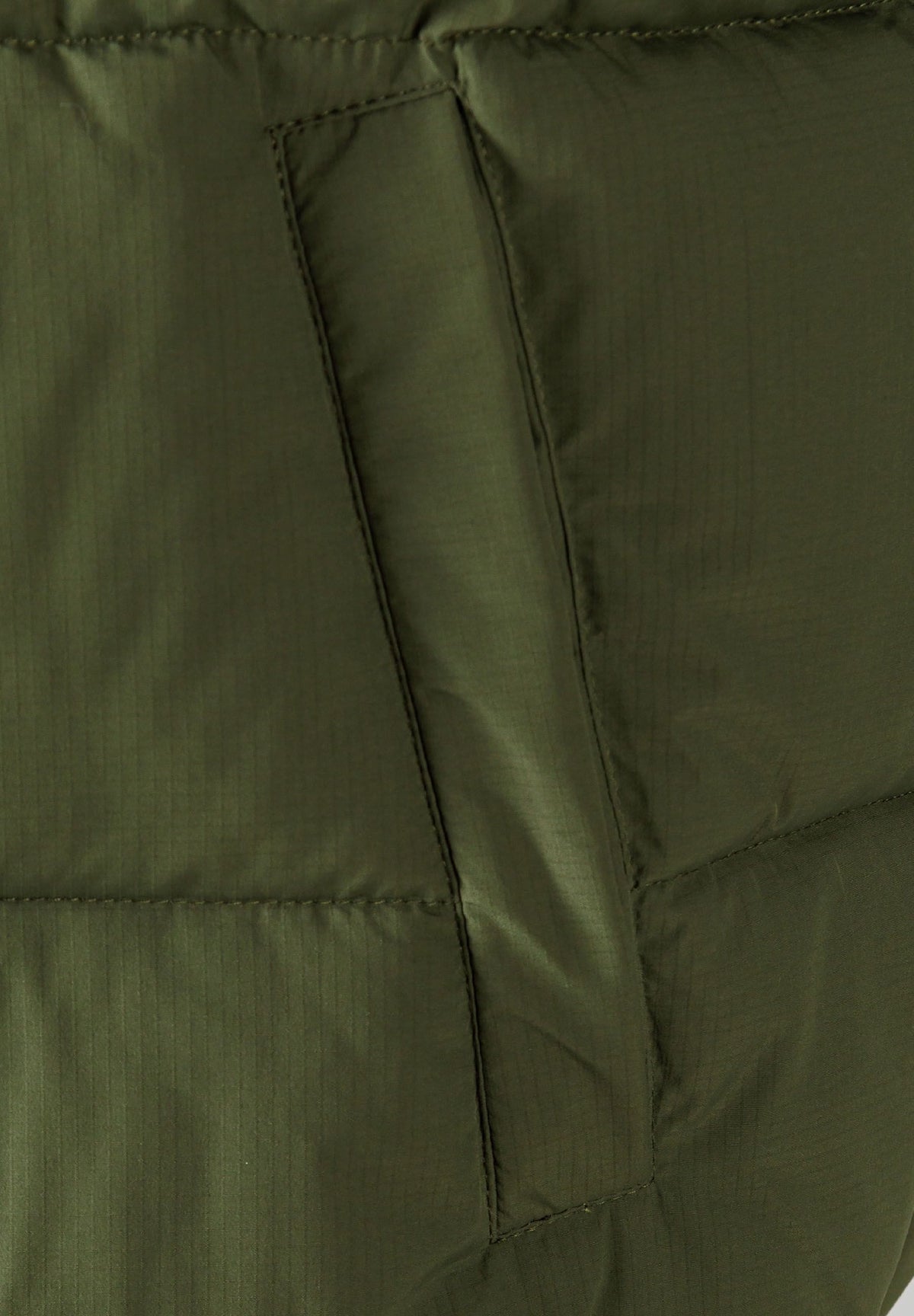 Olive green padded gilet, pocket detail.