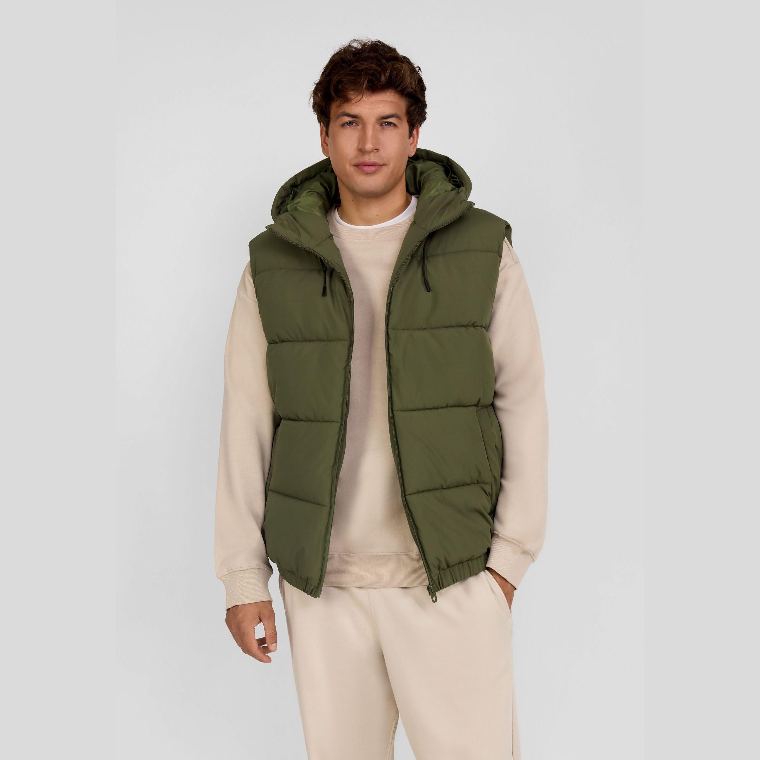 Men's khaki ripstop gilet with hood, full zip, horizontal quilting, and side pockets.