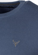 Close-up of blue fine knit jumper with ribbed crew neckline and embroidered logo on chest.