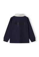 Boys long sleeve navy polo shirt, back print, structured collar, ribbed cuffs.