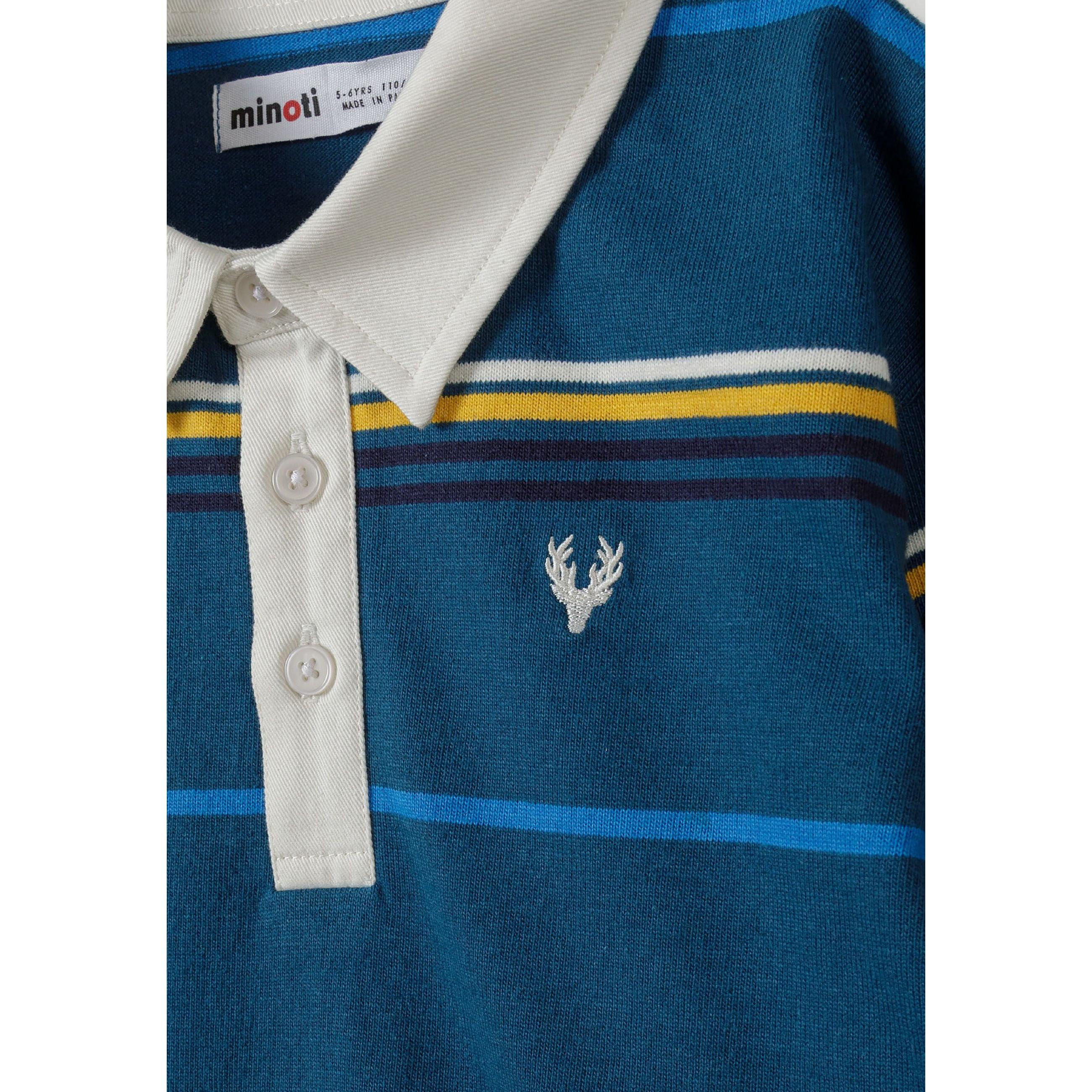 Close-up detail of turquoise polo shirt showing white collar, button placket with white buttons, Minoti label and embroidered stag logo on chest