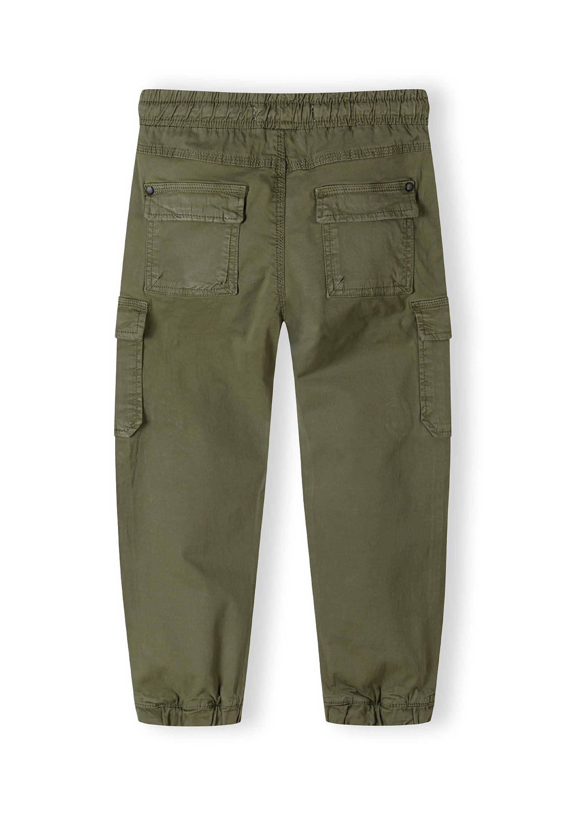 Boys khaki cargo trousers, back view, featuring elastic waist and side pockets.