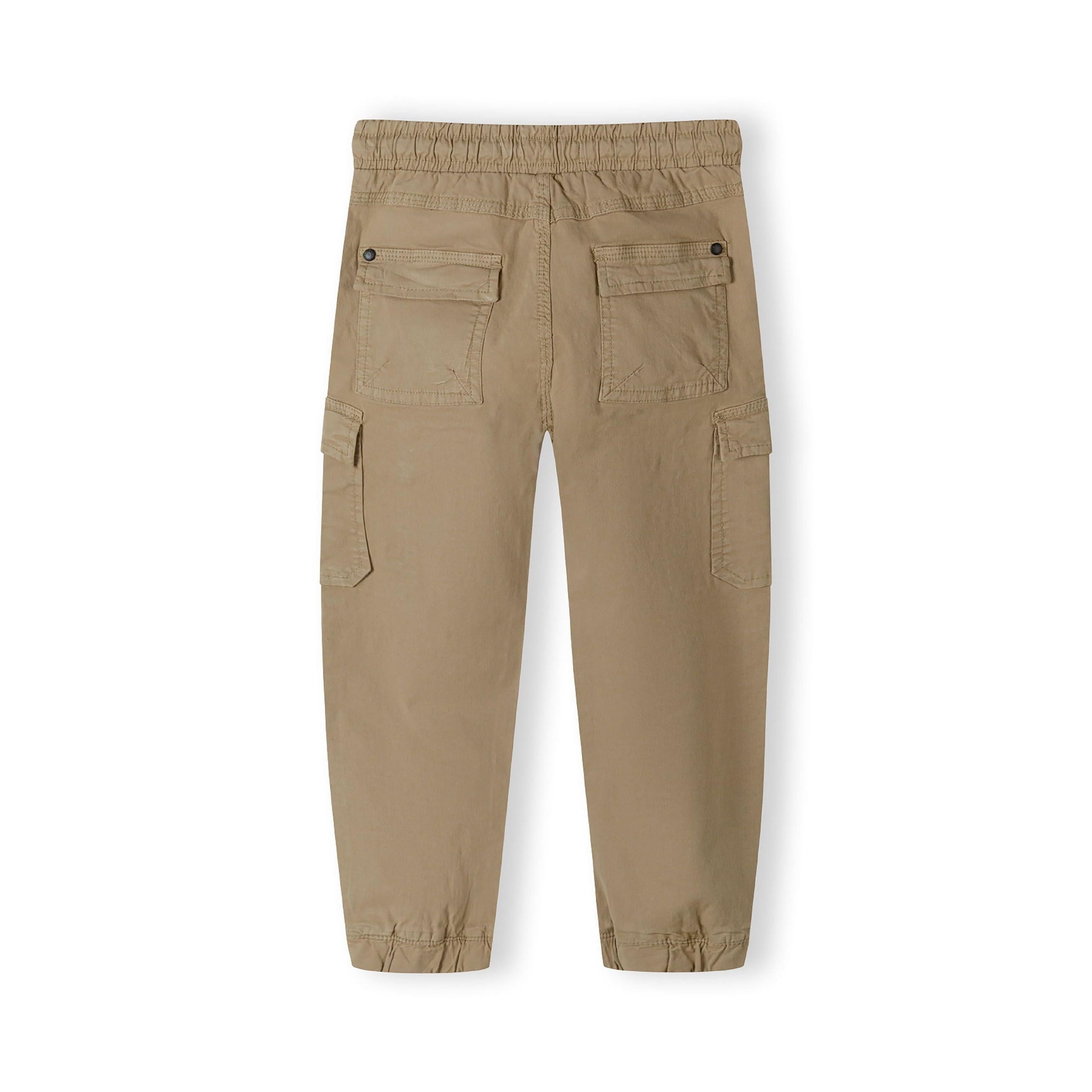 Back view of grey cargo trousers showing elasticated waistband, cargo pockets and ankle cuffs on white background