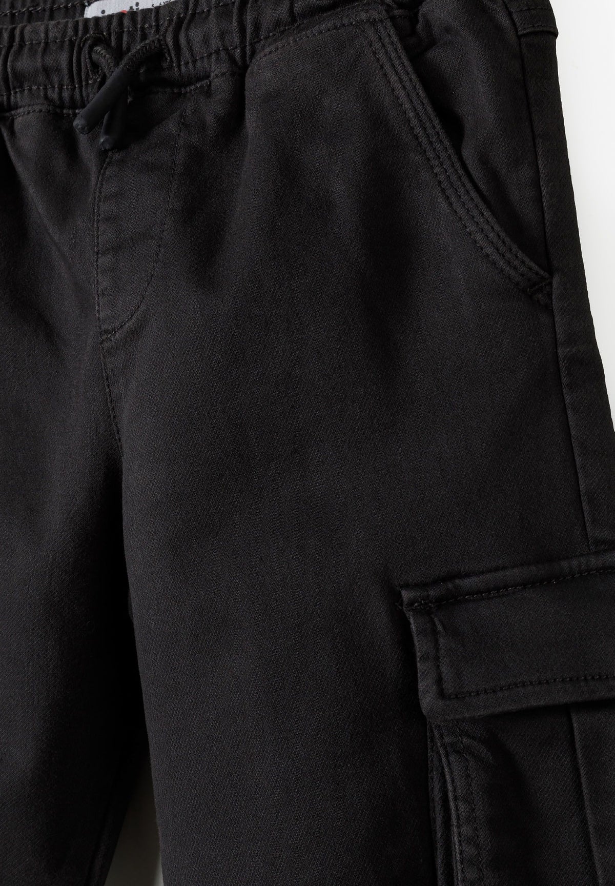 Dark grey cargo trousers, waist tie, side pocket and cargo flap.