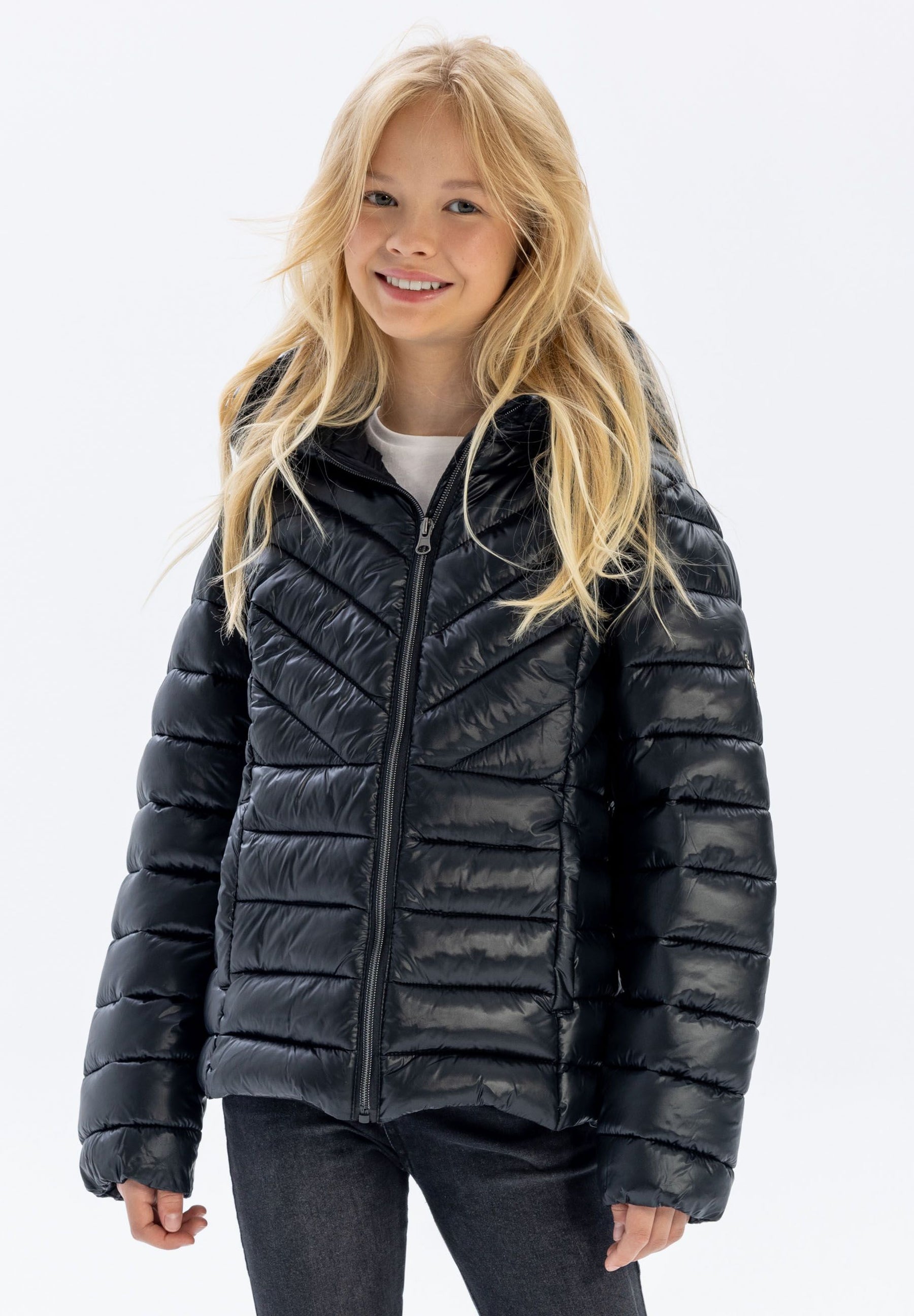 Girls quilted black hooded jacket, front view, features zip fastening and chevron pattern.