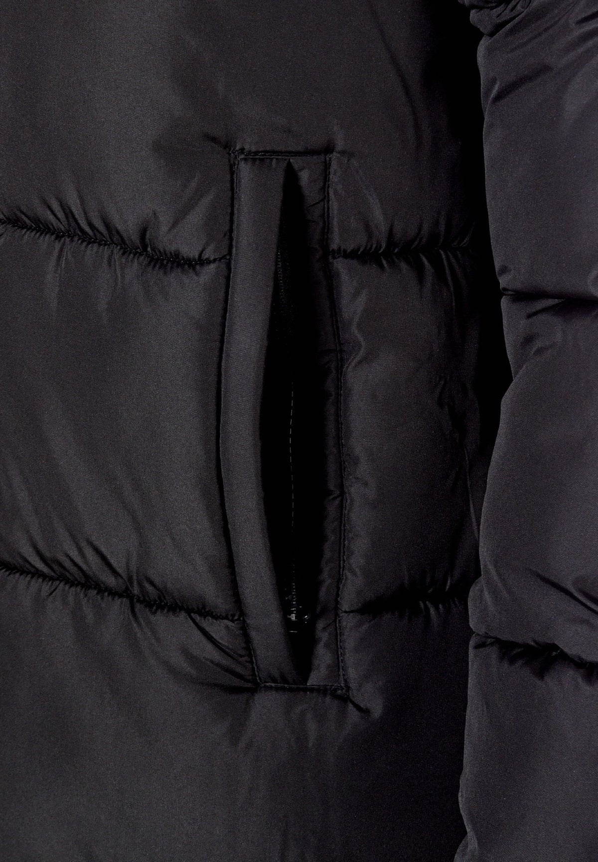 Close-up of the pocket on the black long puffer coat.