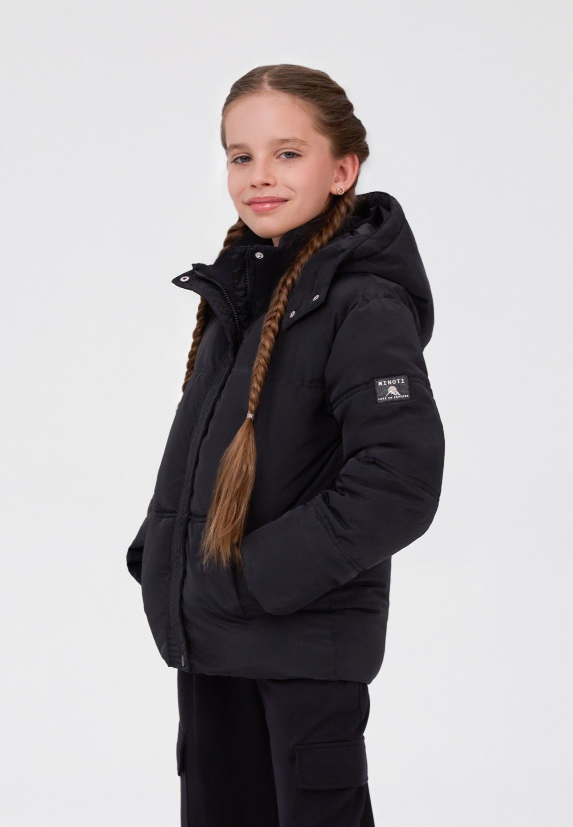 Steppjacke für Mädchen in Schwarz mit Strickkragen und Kapuze