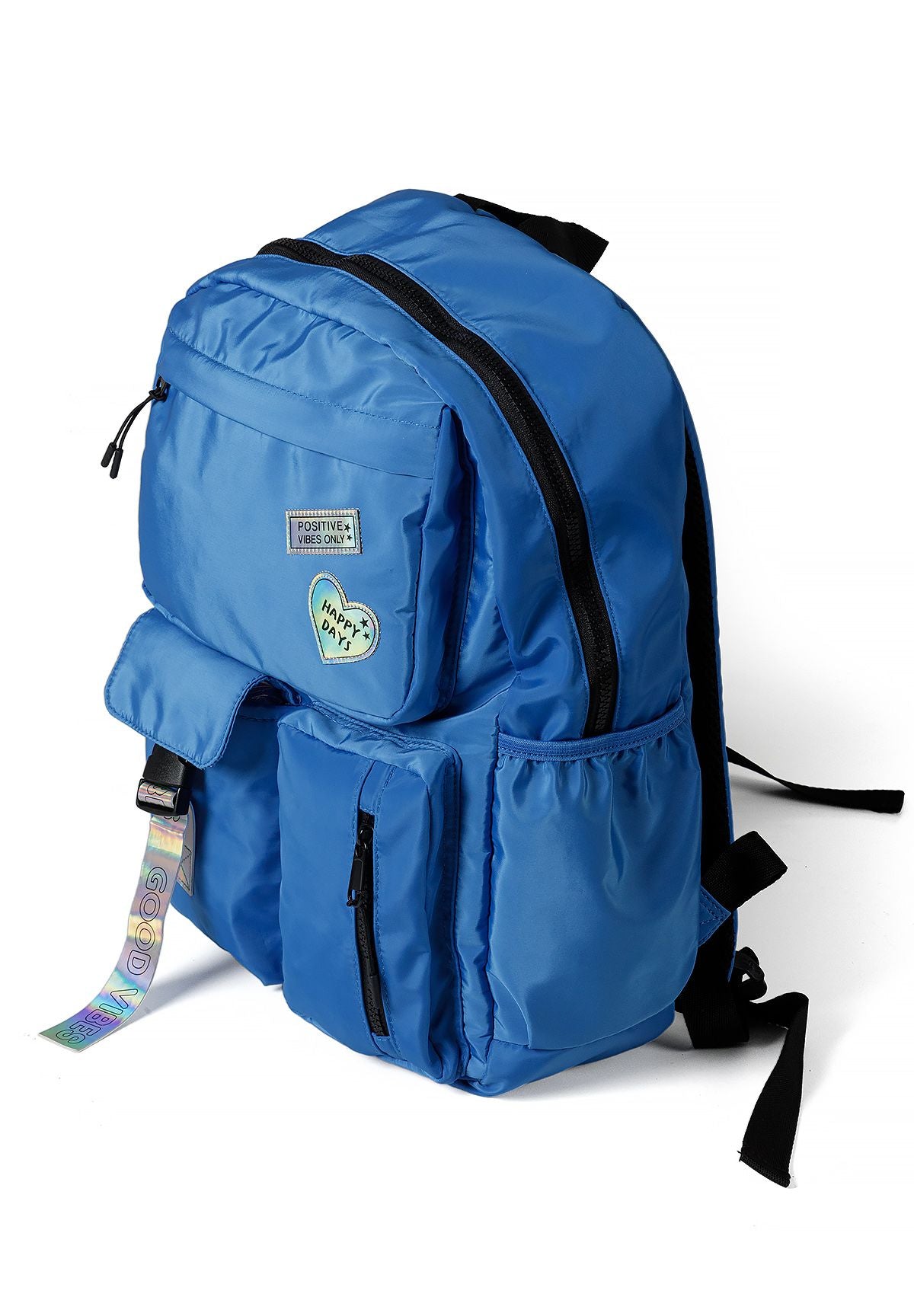 Blauwe meisjesrugzak met glanzende badges, zijaanzicht.