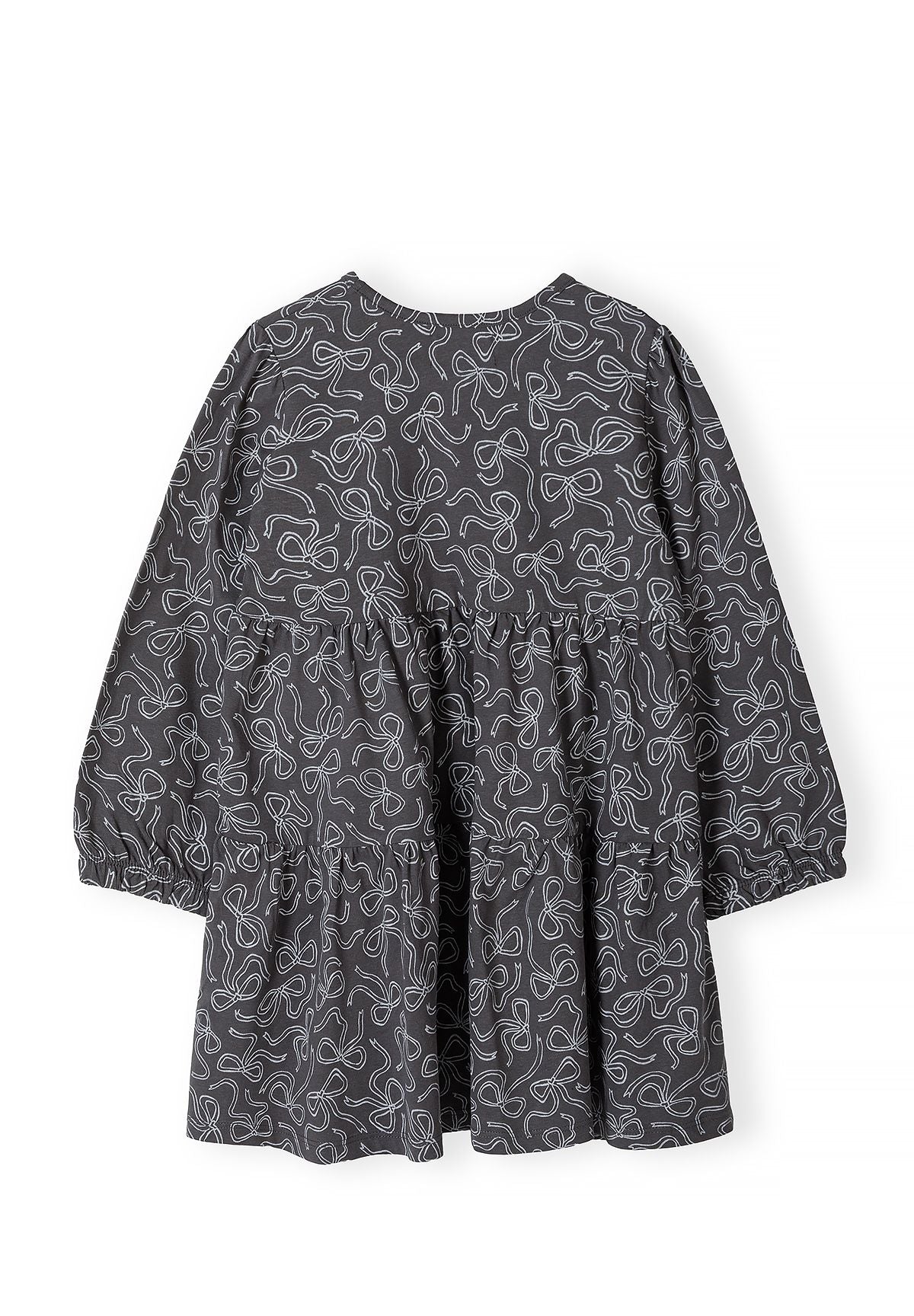Back of charcoal bow-print tiered dress with long elastic-cuff sleeves.