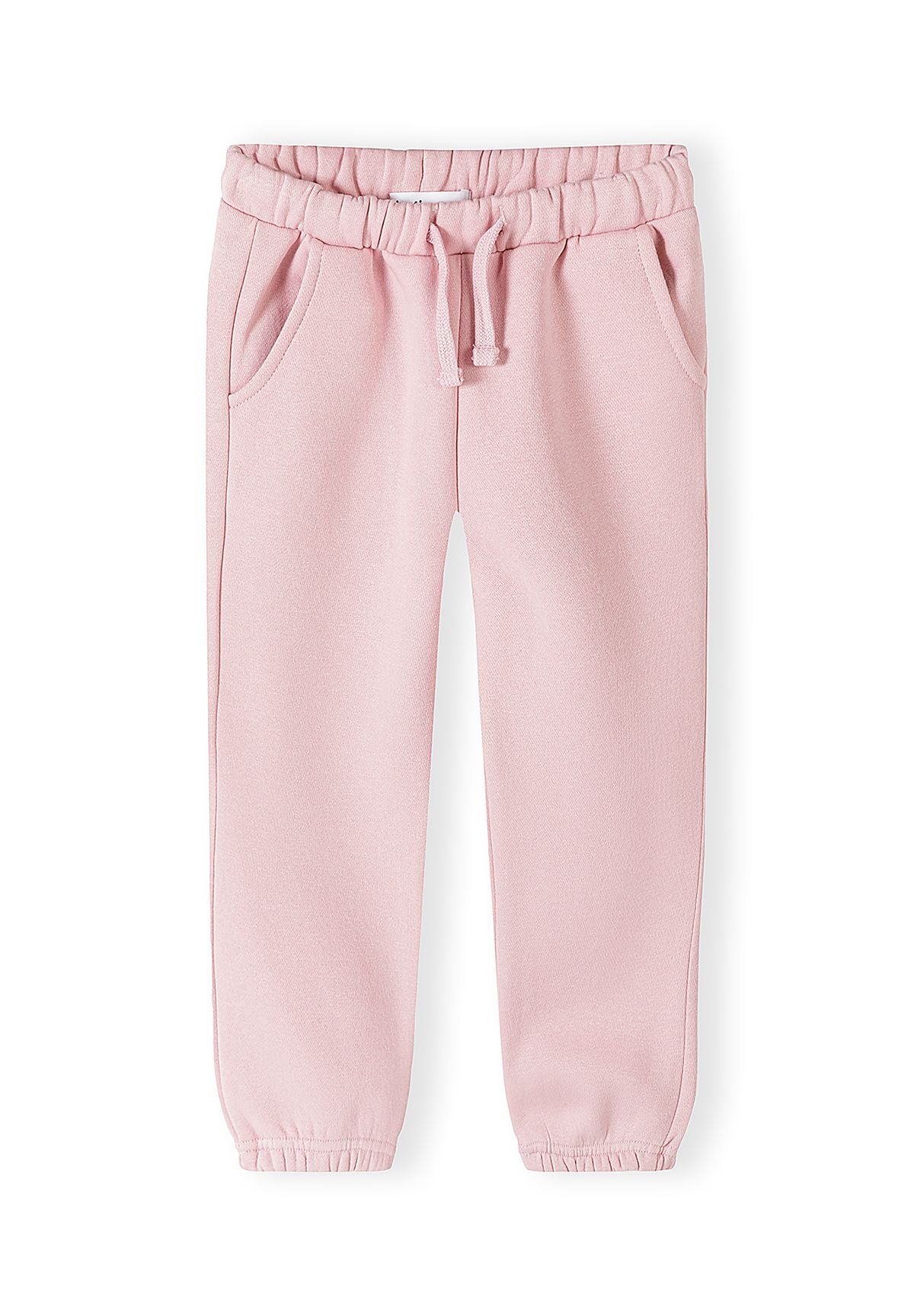 Survêtement rose à volants pour fille, composé d'un sweat-shirt et d'un pantalon de jogging, vue de face.