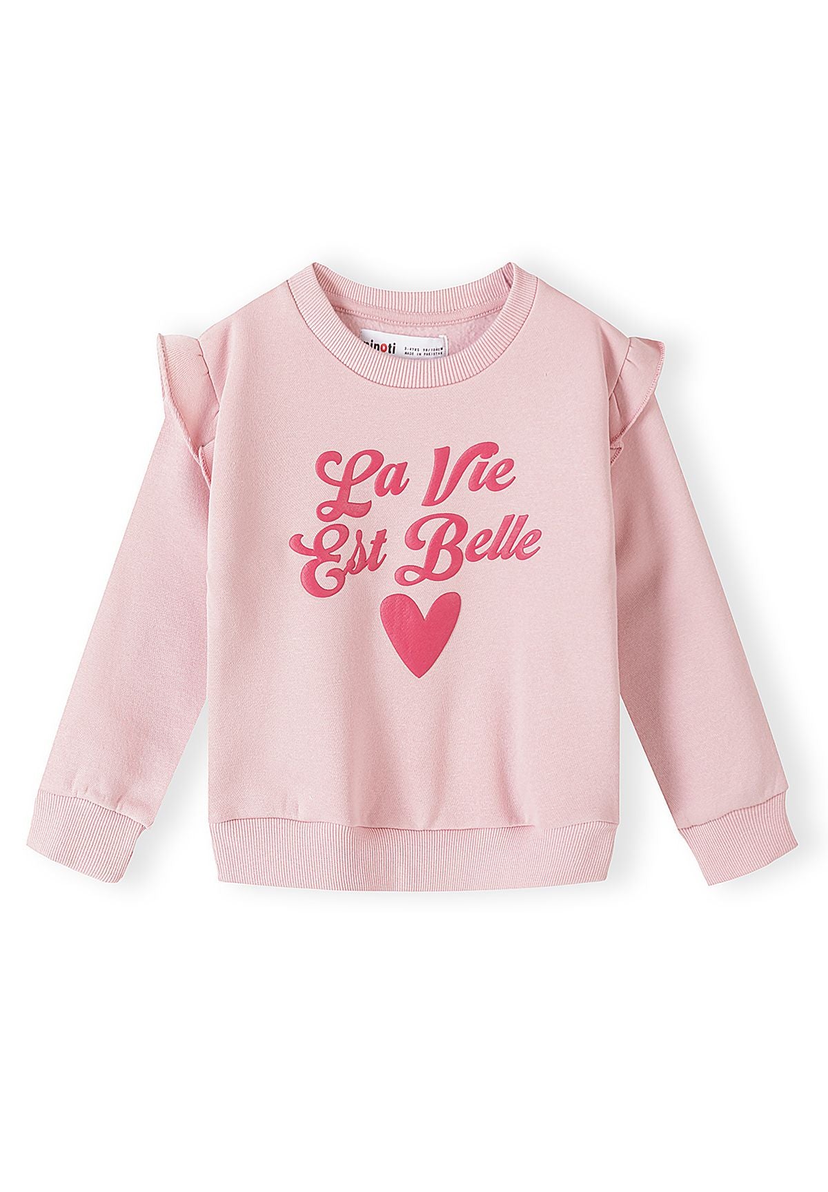 Survêtement rose à volants pour fille, composé d'un sweat-shirt et d'un pantalon de jogging, vue de face.