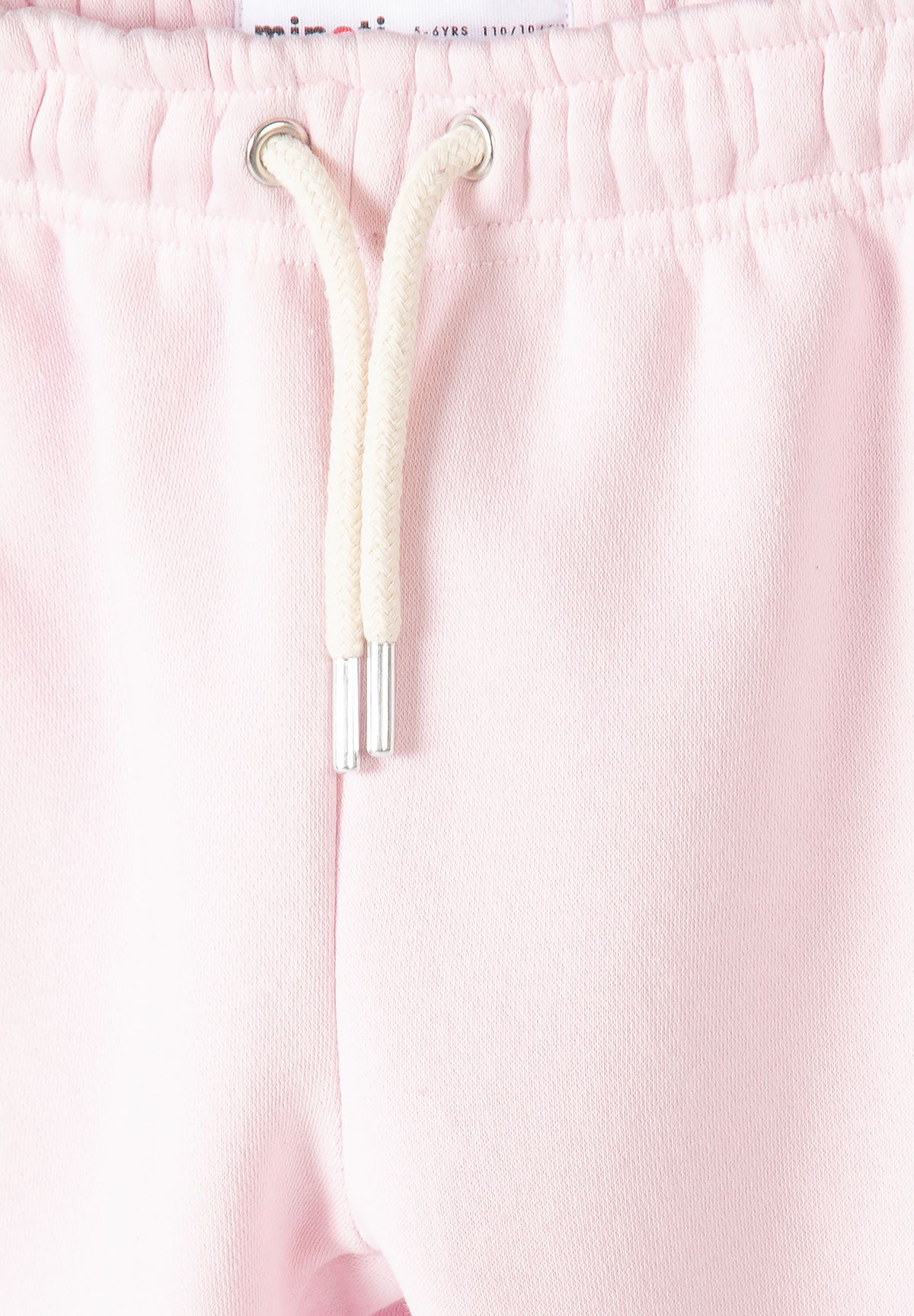 Pantaloni da jogging da bambina con risvolto, neri, bianchi e rosa (confezione da 3), primo piano del cordoncino in vita.