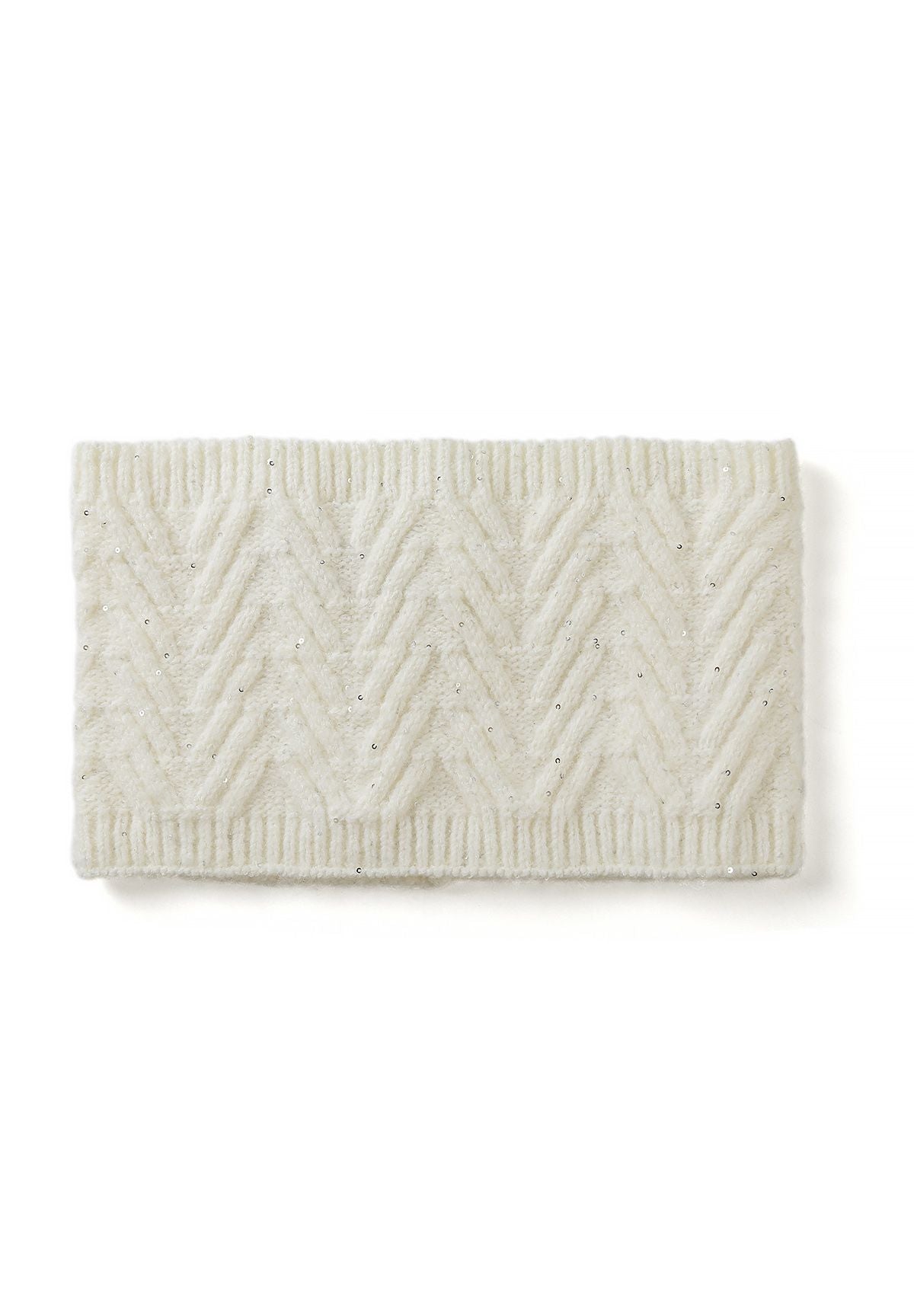 Cream knitted snood laid flat, with chevron cable pattern, small sequins and ribbed edges.