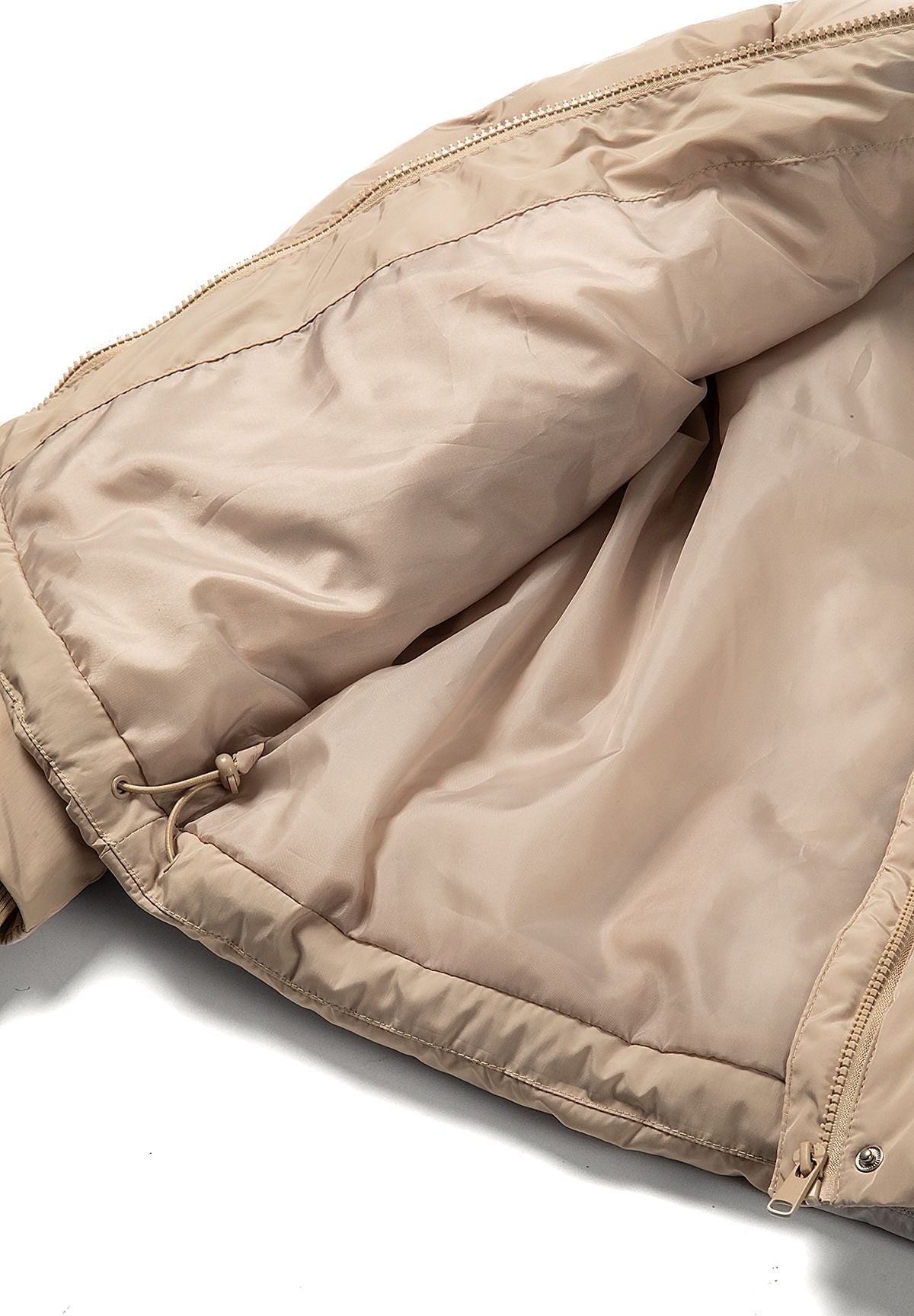 Women's short puffer jacket in beige with hood, inside view of the lining and hem drawcord
