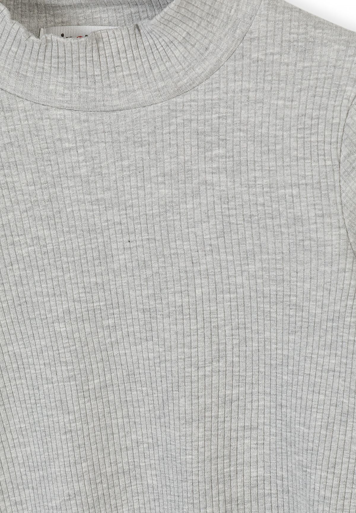 Close-up of grey marl top's fine vertical ribs and raised neckline.