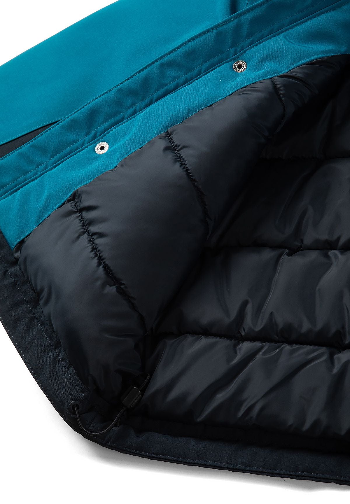 Inside of the teal parka showing dark quilted lining and metal snaps along the teal facing.