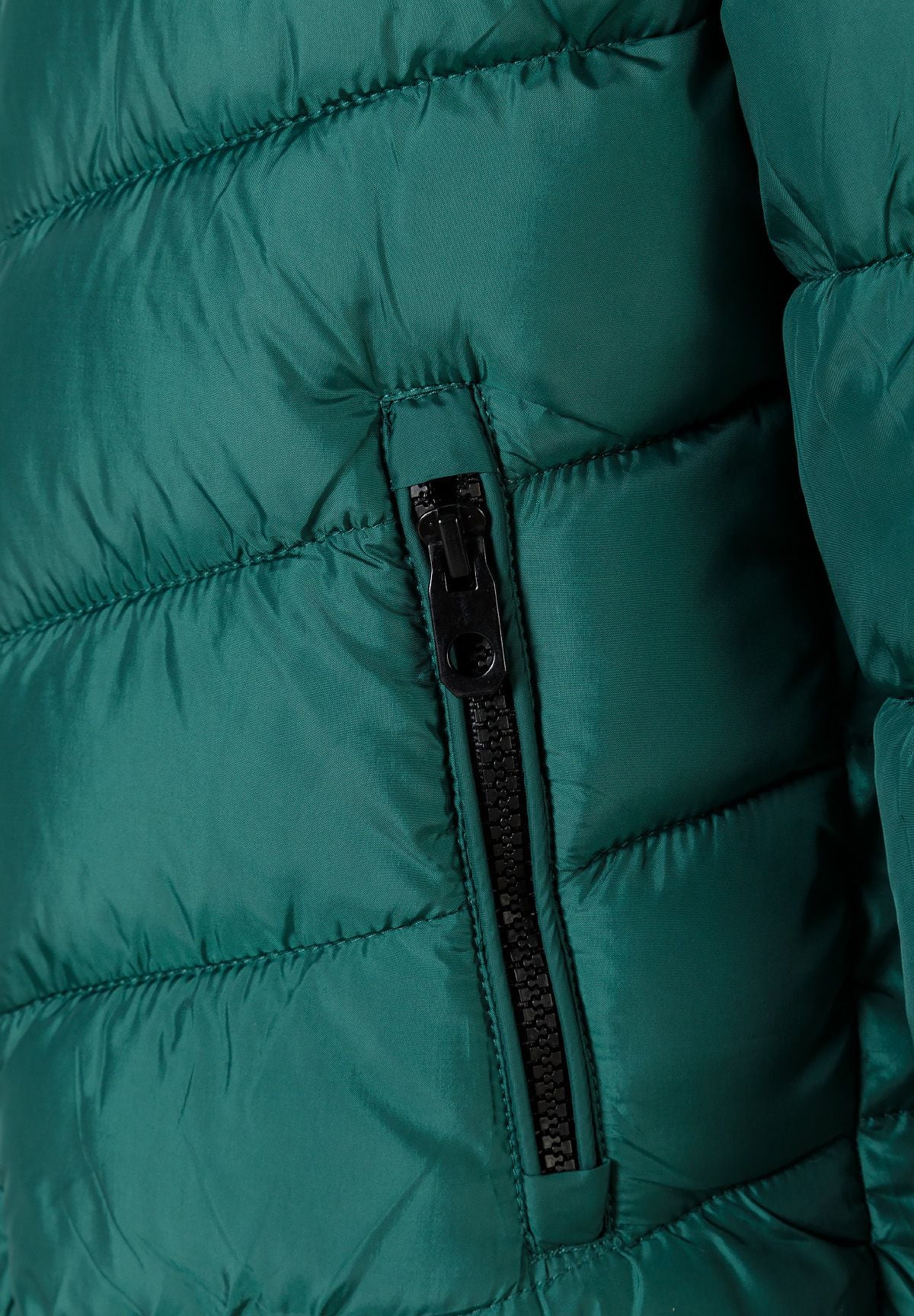 Close-up of a black vertical side-pocket zip on the teal-green padded front.