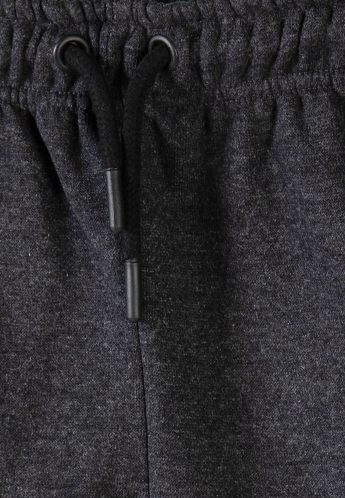 Pantaloni da jogging da bambino neri e antracite con tasche con cerniera (confezione da 2), primo piano della cintura antracite.