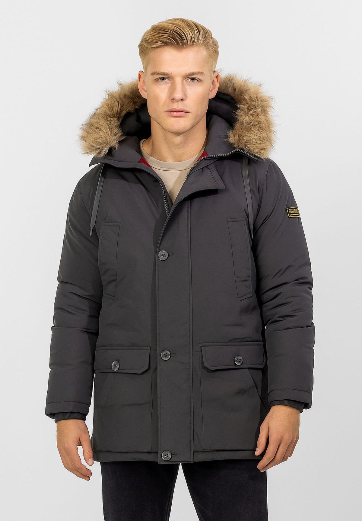 Men's dark grey parka, shown worn.