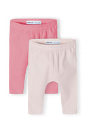 Girls 2 pack ribbed leggings pink 0-18m featuring fine ribbed texture in pink shades. Suitable for everyday wear.  