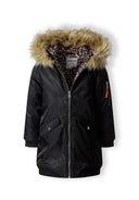 Girls longline parka jacket fur trim hood black 3-14y features a black outer shell, faux fur trim, and leopard print lining. The perfect winter coat.