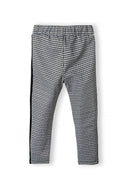 Legginsy w pepitkę z bocznymi lampasami