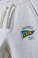 Spodnie dresowe ze ściągaczami i aplikacją