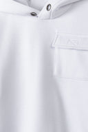 Boys fleece hoodie chest pocket white 2-14y, soft white fleece fabric, functional chest pocket detail. 