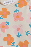 Girls short sleeve bodysuits with print light pink 0-18m featuring colorful floral designs on a soft background. 