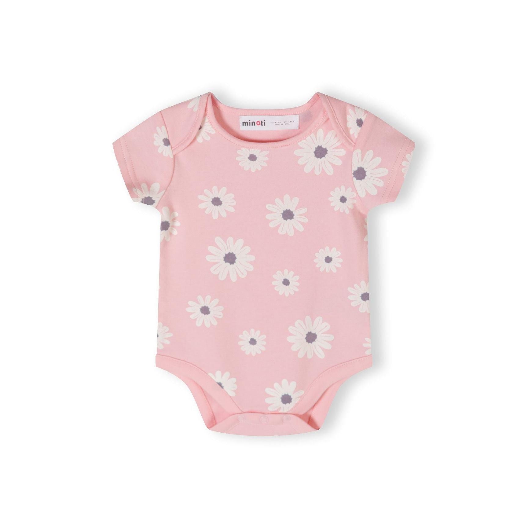 Single light pink short sleeve bodysuit with white daisy flower print pattern scattered across the fabric on white background